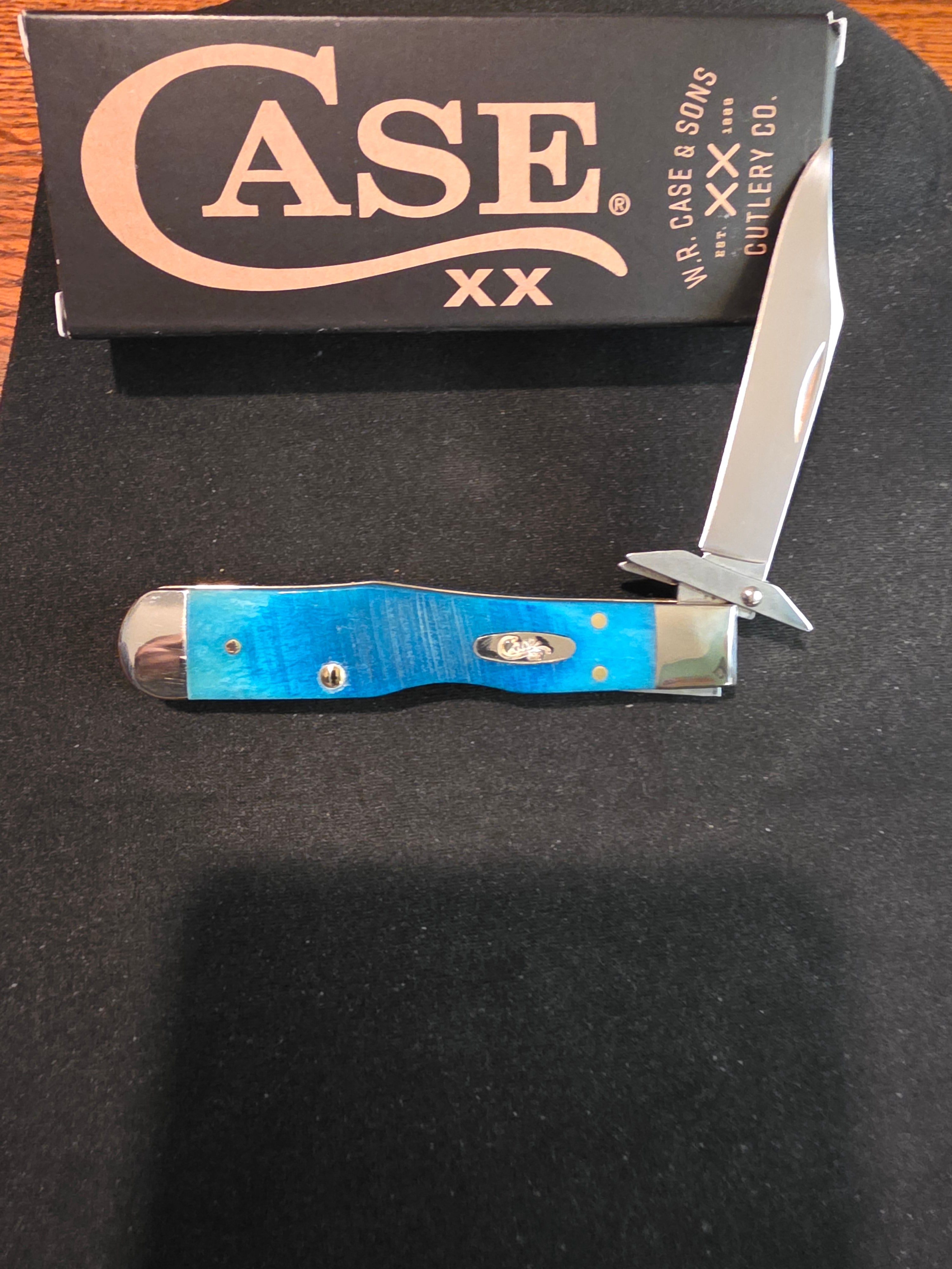 Case Cheetah Cub Sawcut Jigged Caribbean Blue Bone 25578
