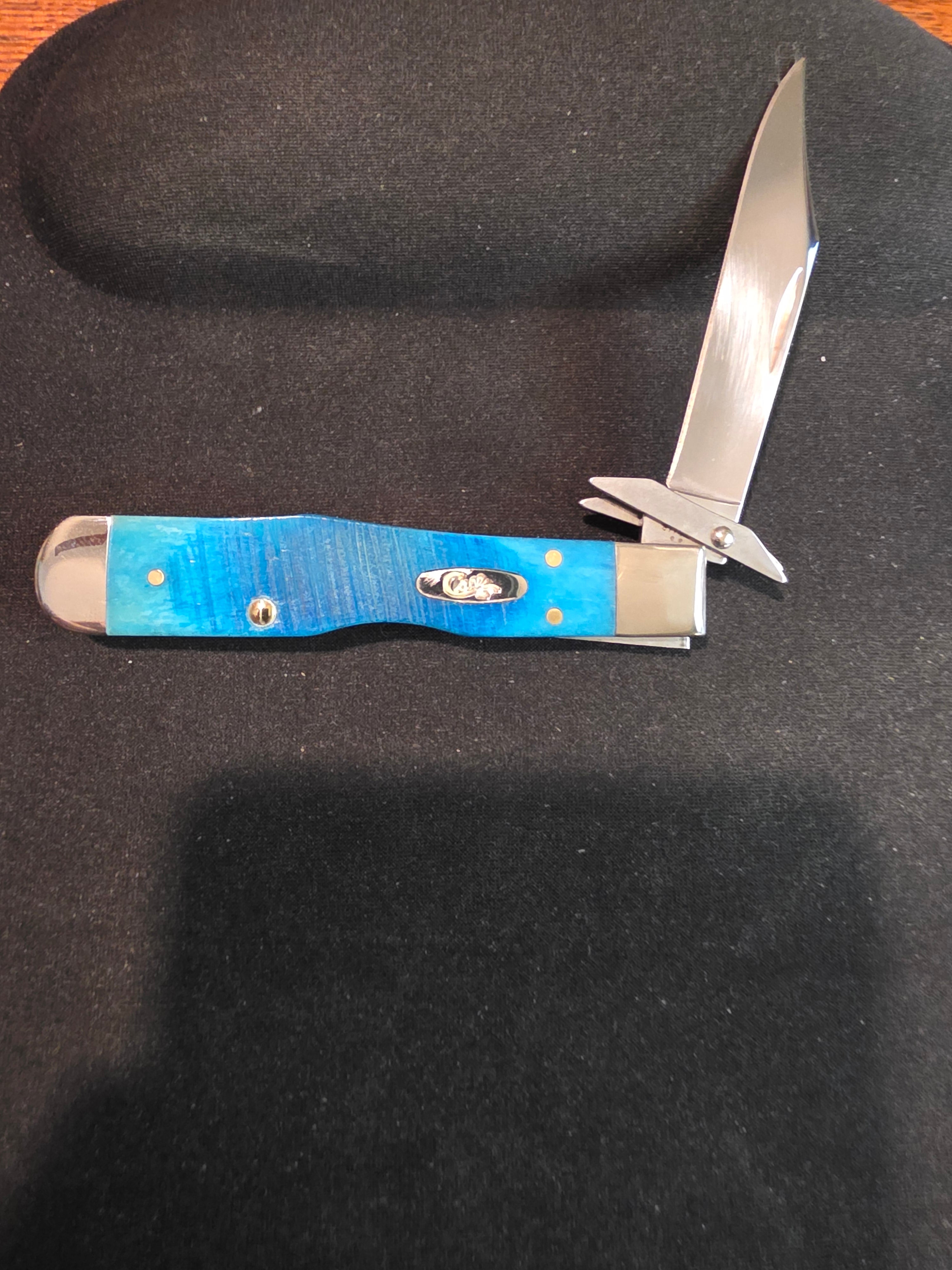 Case Cheetah Cub Sawcut Jigged Caribbean Blue Bone 25578