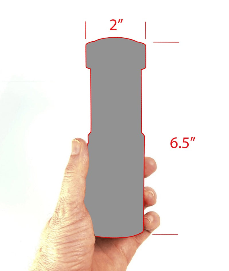 Hand holding a gray rectangular object with measurements indicated on a white background